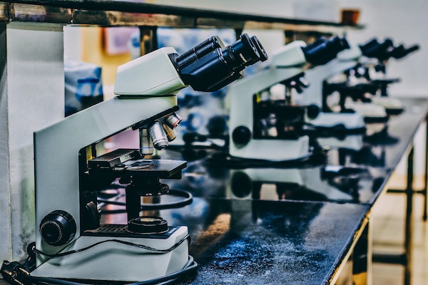 Microscopes exemplifying use of metal components in machines in medical industry